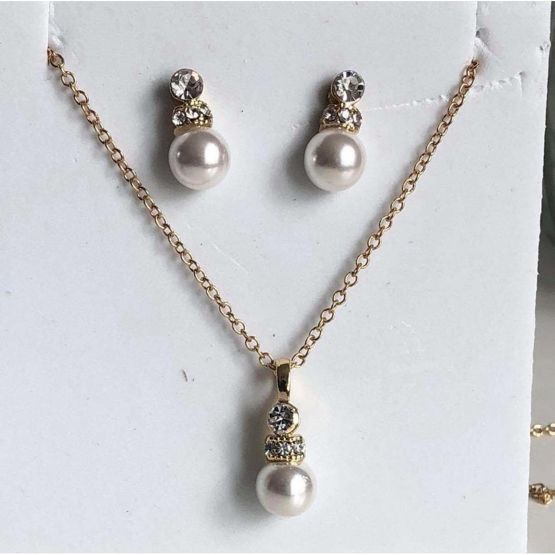 Halsband örhängen set gyllene med pärla hängen